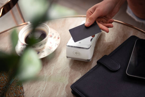 istock contactless payment by credit card and POS terminal 1691077764