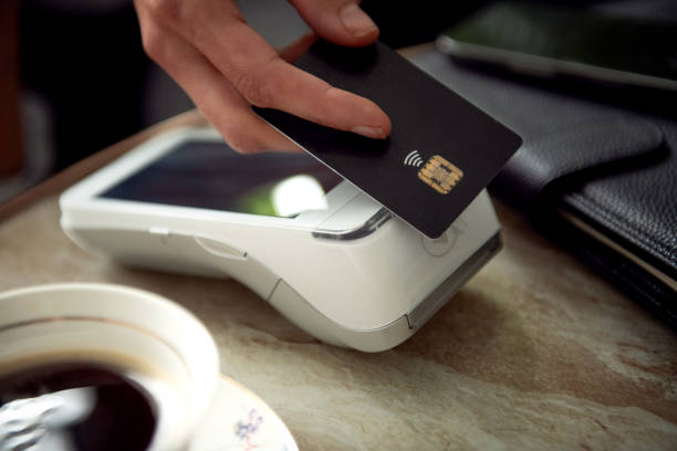 istock contactless payment by credit card and POS terminal 1691078320