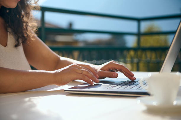 istock Close-up. Woman's hands on laptop keyboard. 1691135823