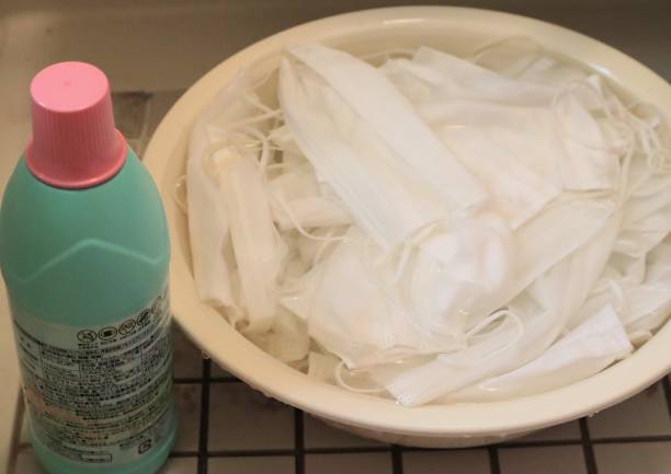 istock Masks disinfected with bleach 1691149139