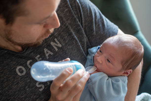 istock Father feeding his newborn baby. Avoiding nipple confusion 1691158028