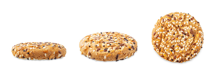 Sesame Chia flax seeds oatmeal cookie on a white isolated background. toning