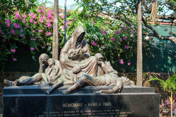 Manila, The Philippines - March 18, 2023: A photo of a war statue called Memorare - Manila 1945, dedicated to victims of war. Located in Intramuros.