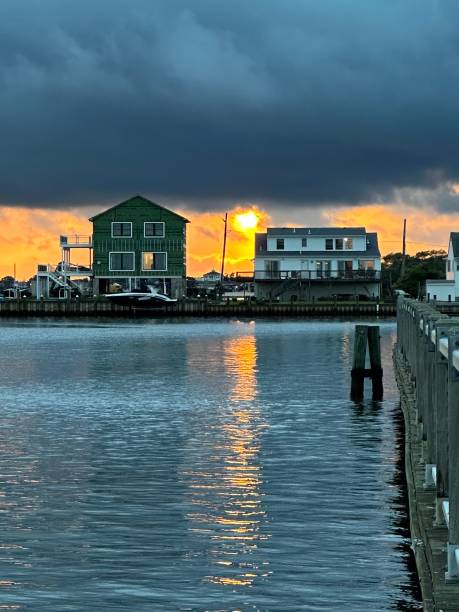 istock Stormy Sunset Off Pier 1691212306