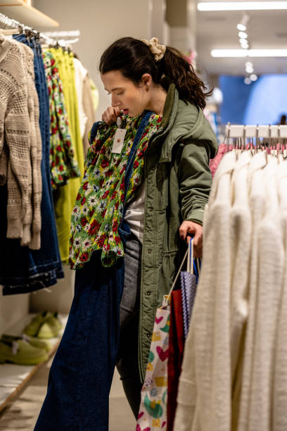 istock Young Woman Shopping for Professional Clothes 1691219520