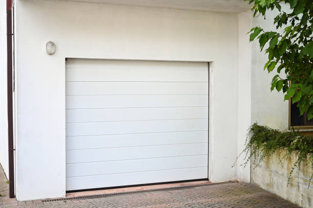 istock white, closed garage outdoors. 1691233176
