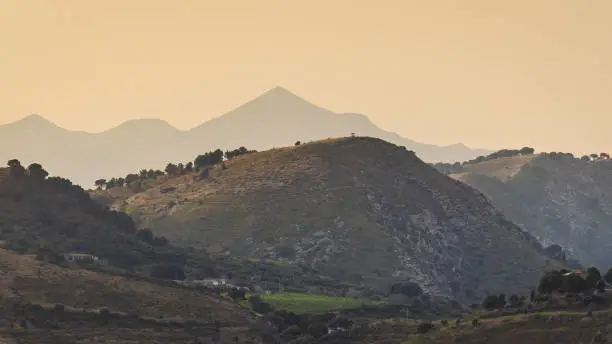 Photo of Sicily, a view of the mountainous landscape inland.