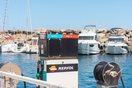 SAN JOSE, SPAIN - 23 MAY 2023 Point of fuel Repsol  supply to ships stationed in the bay in the town of San Jose, in the centre of Parque Natural de Cabo de Gata, Almeria province