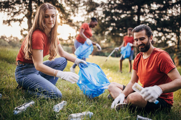 istock Volunteers cleaning nature 1691347866
