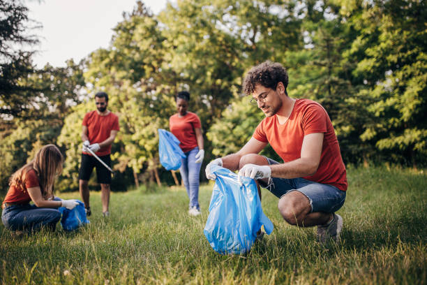 istock Volunteers cleaning nature 1691351977