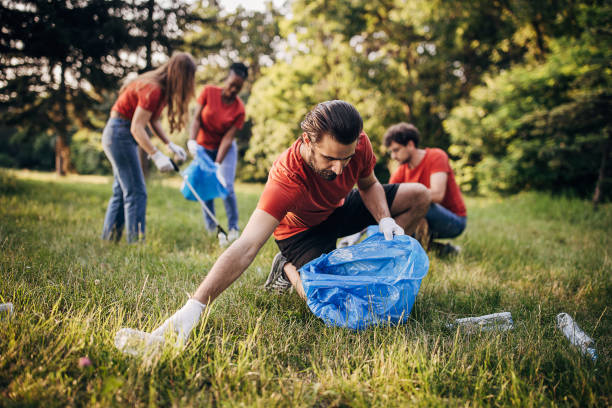 istock Volunteers cleaning nature 1691352601
