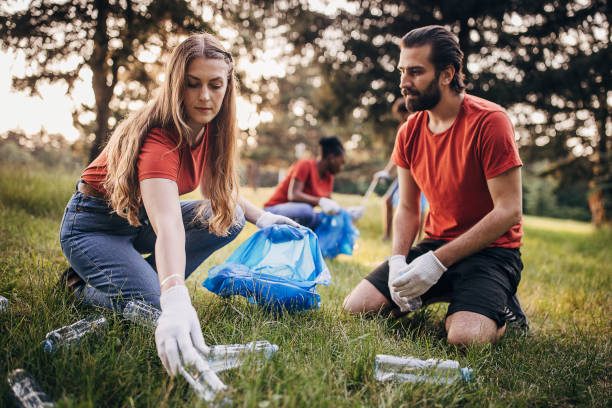 istock Couple cleaning nature 1691357007