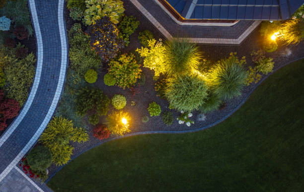 Elegant LED Illuminated Residential Back Yard Garden Aerial View. Elegant Small Residential Back Yard Garden Illuminated by Outdoor Lights Aerial View. landscaping stock pictures, royalty-free photos & images