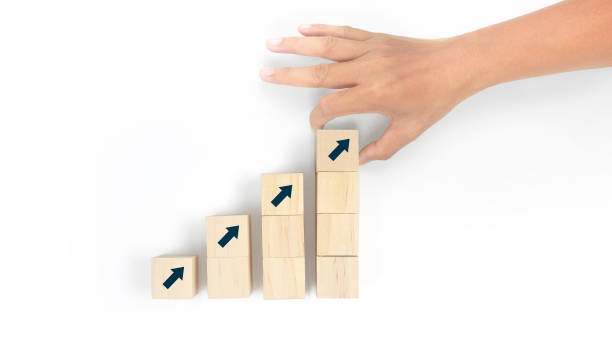 istock Business connecting piece of multi wood chart blocks steps in hand 1691366808