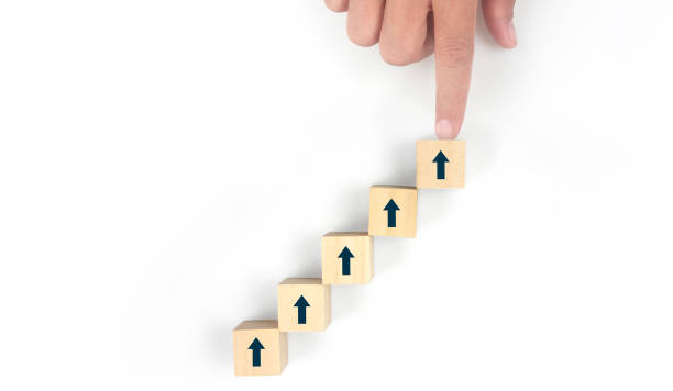 istock Business connecting piece of multi wood chart blocks steps in hand 1691366810