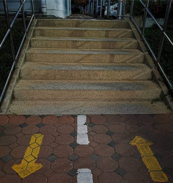 istock Stairs and walkways next to buildings at night 1691367924