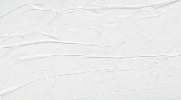 istock White blank crumpled and creased paper poster texture background 1691408193