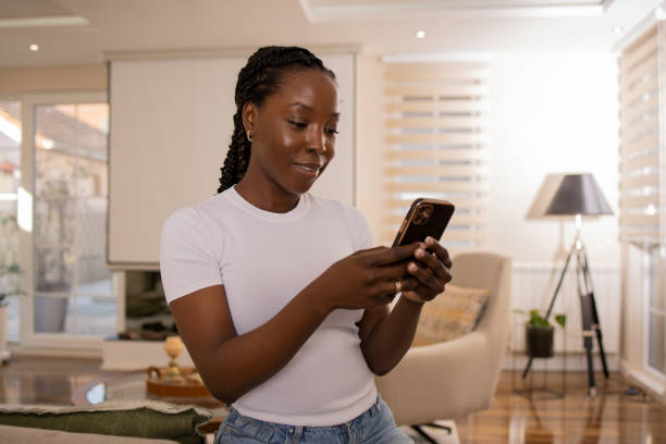 istock Happy young woman using phone 1691408474