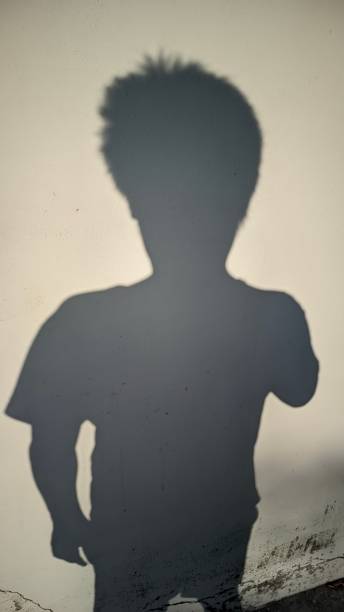 istock the shadow of someone being narcissistic while taking photos on the wall 1691409110