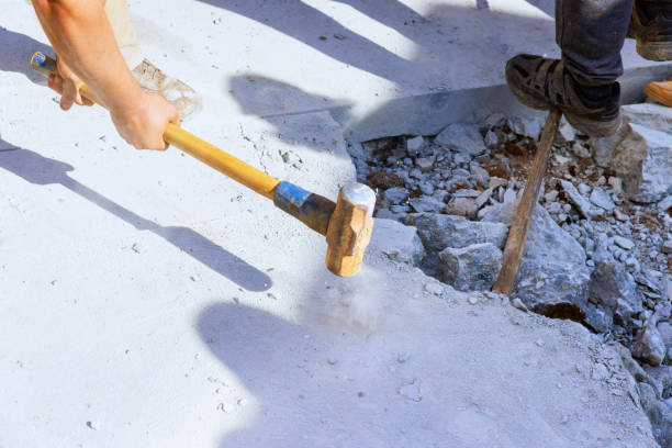 istock Concrete sidewalk destruction and repair old pavement being fixed 1691433919