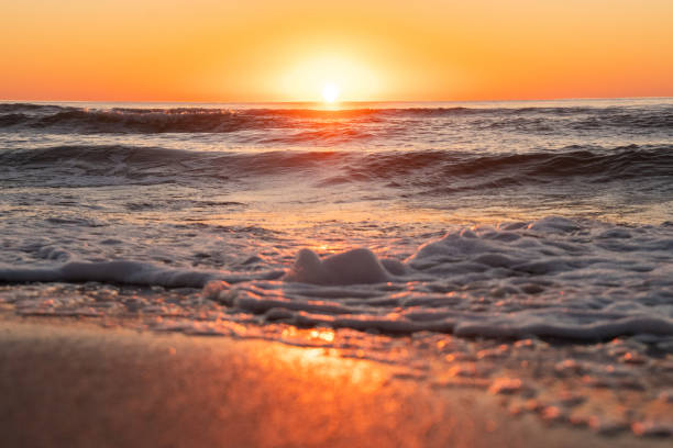 istock Sunrise over the waves of the Atlantic Ocean 1691457100