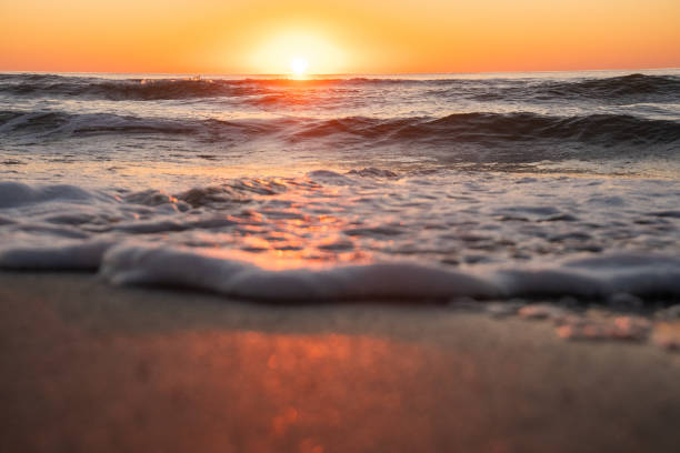 istock Sunrise over the waves of the Atlantic Ocean 1691457101
