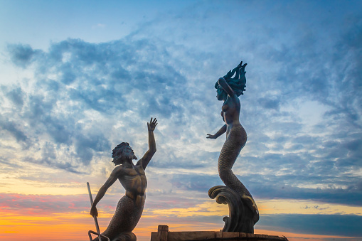Puerto Vallarta, Jalisco Mexico, September 26 2023 sculpture called Triton and Mermaid created in 1990 by the artist Carlos Espino, on the malecon of Puerto Vallarta, Jalisco.