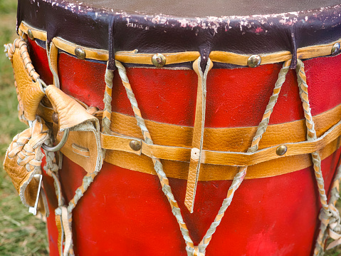 Indian drum and drum sticks placed in  a symbolic manner after the drummers complete their song at a Native American pow-wow.