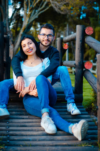 istock couple in love hugging each other outside 1691479115