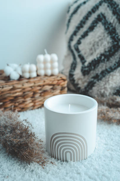 istock Candle in boho style in home interior 1691481833