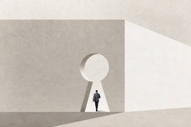 Man Walking Through A Large Keyhole - fotografia de stock