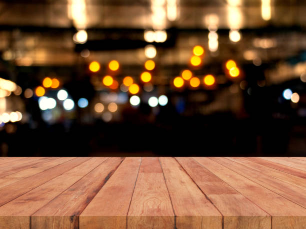 istock perspective wooden board over blurred bokeh light 1691614383