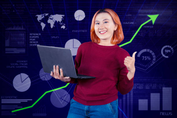 istock Photo of positive promoter lady using laptop computer making thumb up 1691678528