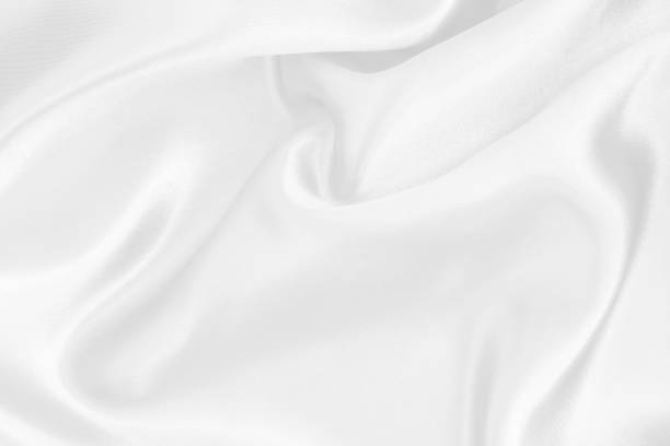 White fabric texture for background and design, beautiful pattern of silk or linen.