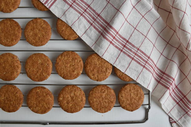 istock Freshly baked cookies on metal greed 1691722432