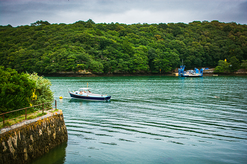 River Fal, Cornwall, UK - August 2023: near King Harry Ferry Bridge crossing from Feock to Philleigh. Its vehicular chain ferry.