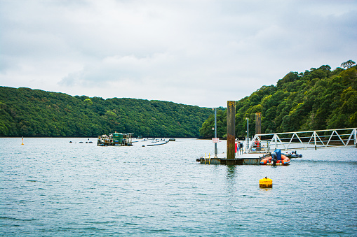 River Fal, Cornwall, UK - August 2023: The King Harry Ferry Bridge crossing from Feock to Philleigh. Its vehicular chain ferry.