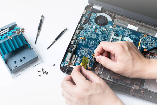 istock repairing laptop 1691743853
