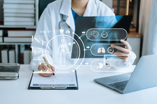istock Medicine doctor using digital tablet and smartphone diagnose virtual electronic medical record on interface.Digital healthcare and network on virtual screen 1691763958