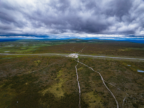 Flatruet is the highest located road in Sweden. It runs over the highland in the landscape of Jamtland and Harjedalen. Seen from a drone.