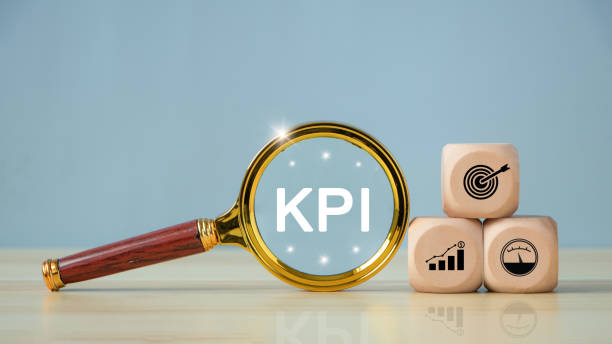 istock KPI, Key Performance Indicator. KPI text on Magnifying glass with KPI icon in the wooden cube for business planning and measure success, target achievement. business strategy growth or success. 1691772762