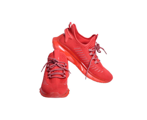 istock Red running shoes isolated on white background. 1691773342