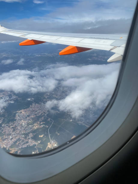 istock View from an airplane window to the wing in the air 1691801697