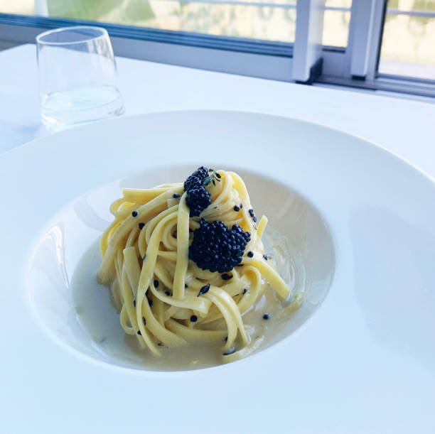 istock Italian food, pasta with caviar. 1691832744