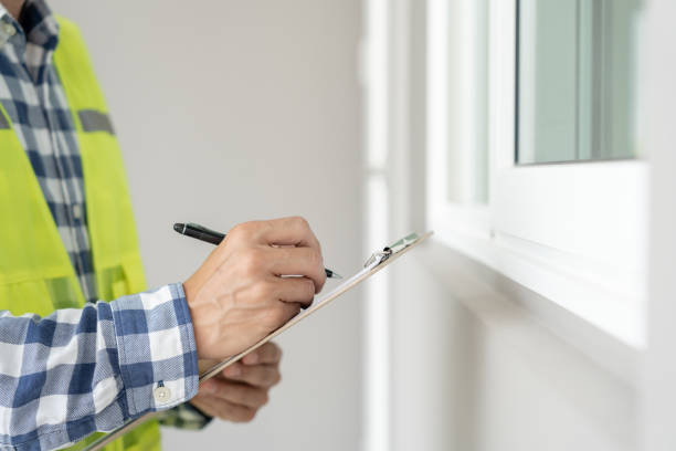 istock inspector or engineer is inspecting construction and quality assurance new house using a checklist. Engineers or architects or contactor work to build the house before handing it over to the homeowner 1691866391