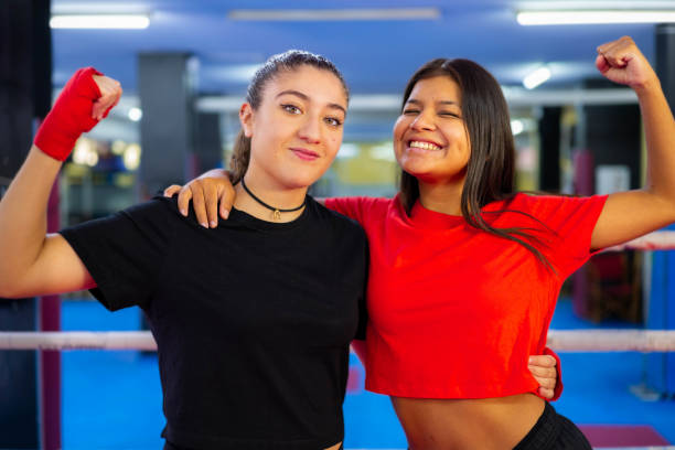 istock Two female boxers portrait in a boxing ring. 1691878055