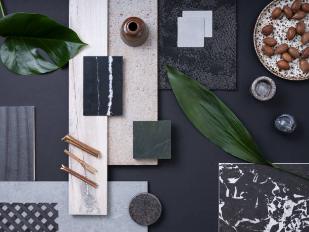 istock Classic flat lay composition in grey and navy color palette with  textile and paint samples, lamella panels, leaves and tiles. Architect and interior designer moodboard. Top view. Copy space. 1691897510