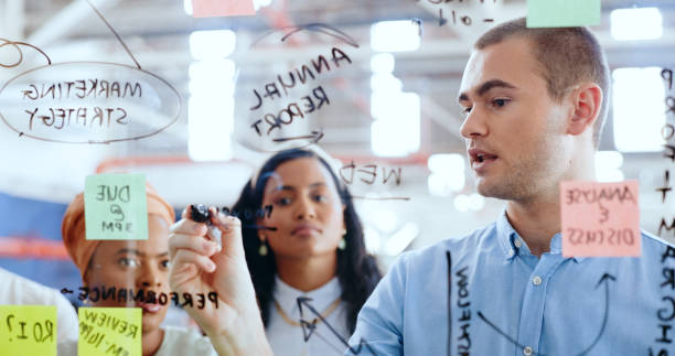 istock Notes, business meeting and idea writing with sticky notes and office team collaboration together. Creative company, thinking and business people planning and working on worker vision and strategy 1691908365