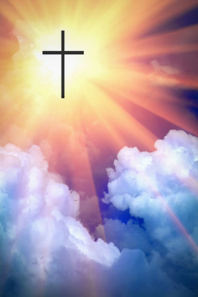 istock Silhouette of Christian cross against blue sky background 1691919086