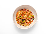 Udon stir-fry noodles with chicken in bowl